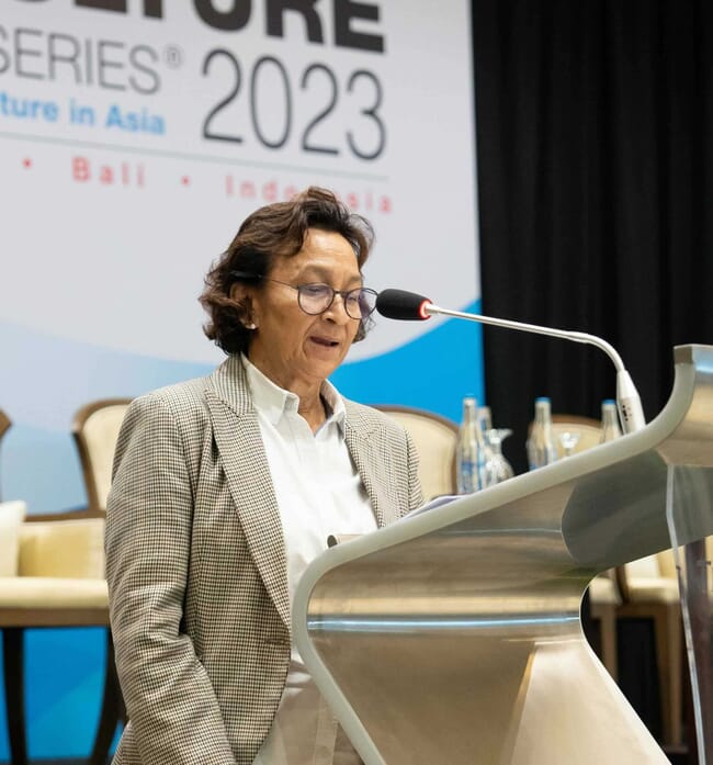A person standing at a podium.